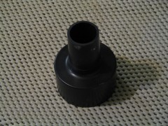A 2-1/2" to 1-1/4" reducer that fits onto then end of a standard Shop-vac hose.