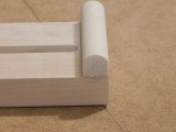 The hold down buisness end has a half round made from soft poplar, to prevent maring of the work piece.
