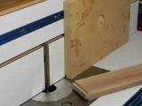 Scrap MDF makes a perfect jig for controll tall narow boards.